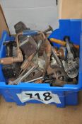 A box of tools to include wooden planes and many other items