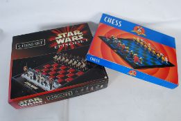 A boxed Star Wars Episode 1 chess set together with a Looney Tunes chess set (complete in boxes)