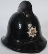 A vintage 1950's / 60's Bristol Fire Brigade firemans helmet. Black painted with affixed Bristol
