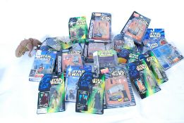 A large collection of 1990's Star Wars toy figurine including Hasbro, micro machines and others.