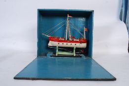 An early 20th century scratchbuilt model ship of the steamer boat ANNA. Painted hull with detailed