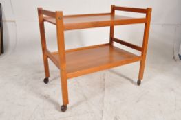 A 1970's retro Spottrup BDFR Furbo Danish teak wood butlers serving table. Square supports with twin