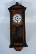 A good miniature mahogany cased vienna regulator wall clock in the manner of Gustav Becker. Having