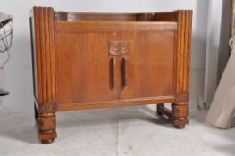 A 1930's Art Deco oak sideboard dresser. Having a series of drawers and cupboards with unusual