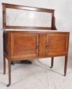 An Edwardian mahogany and marble top washstand cabinet. The square tapered legs with twin doors