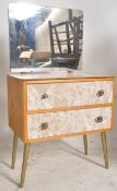 A 1960's formica dressing table chest of drawers. Turned legs with formica applied chest of 2