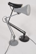 A grey Herbert Terry anglepoise desk lamp stamped for Redditch together with a similar style black
