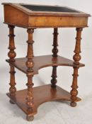 A Victorian walnut davenport desk. Turned columns having inverted demi lune tiers with writing slope