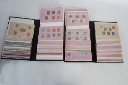 2 folders of vintage English and continental stamps to include Canada, New Zealand, Egypt, USA,