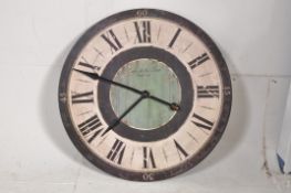 A contempory large shabby chic wall clock