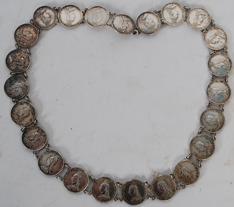 A silver threepence coin belt necklace comprising of 23 1887 silver threepence coins having Victoria