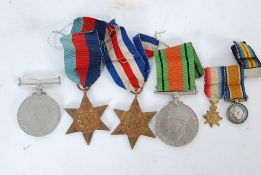 A group of medals to include the France Germany Star, the WW2 Star ( both on ribbons) together