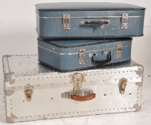 A large aluminium steamer trunk together with a pair of retro 1970's vintage suitcases. 29cms  x