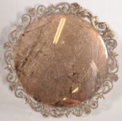 A 1940's Art Deco peach glass mirror in fret decorated frame by Atsonia. The shabby chic frame