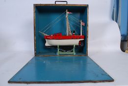 An early 20th century scratchbuilt model ship of the steamer boat BESA. Painted hull with detailed