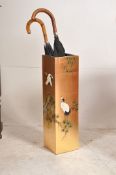 An Oriental Japanese umbrella stand decorated with cranes / foliates complet with vintage