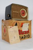 A vintage Bush bakelite radio circa 1960's in the original box with instructions.