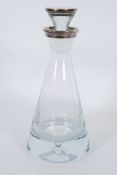 A contemporary conical decanter, silver mounted conical stopper, flared collar, heavy base with