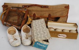 A vintage canvas sports bag complete with tennis racket by Slazenger, boxed balls, boxed Dunlop blue