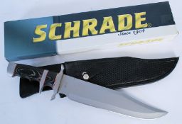 A Schrade bowie knife complete with original packaging