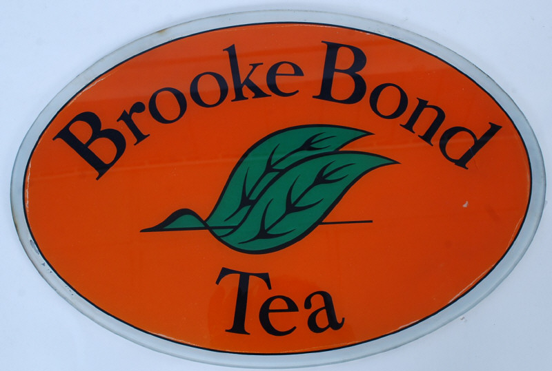 A vintage oval shop advertising window display sign for Brooke Bond Tea. Being constructed of