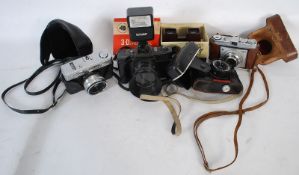 A collection of vintage cameras to include Nippon and others along with flash heads etc ( see