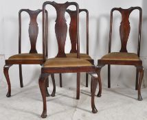 A set of 4 1920's Arts & Crafts revival oak dining chairs. Square tapered legs with spade feet