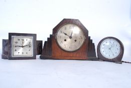 A collection of 4 vintage clocks to include a good 1930's Art Deco oak cased mantel clock