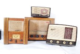 A collection of 4 vintage transistor radiosm 2 being bakelite, the other a Pye valve radio and