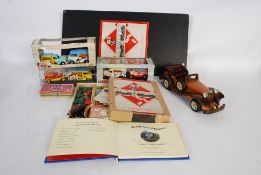 A collection of toys and games to include 1940's Monopoly set, Lledo collectable model car,
