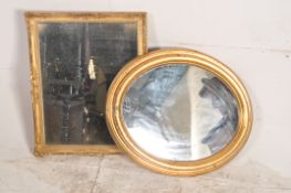 A 1950's gilt plaster rococo mirror together with an oval wall mirror