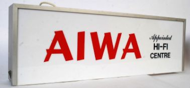 An original vintage shop advertising electric light display sign for Aiwa Hi-Fi centre.
