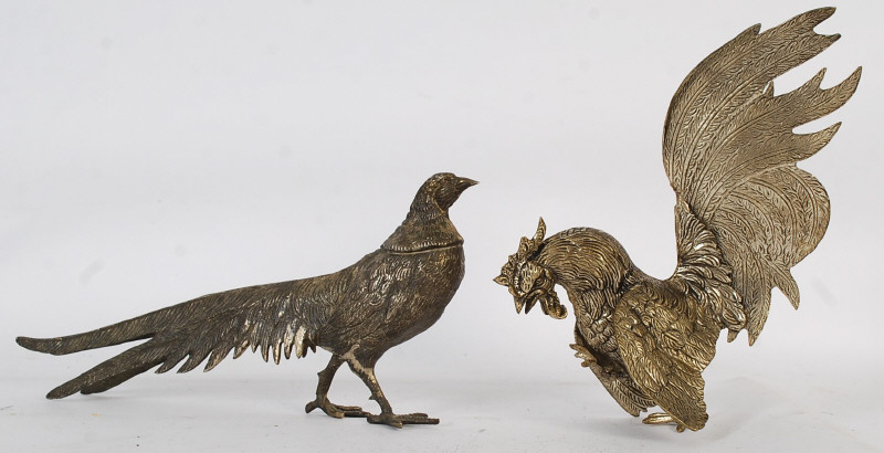 A vintage silver plate figurine of a pheseant along with one of a fighting cockerill. Largest 29cm