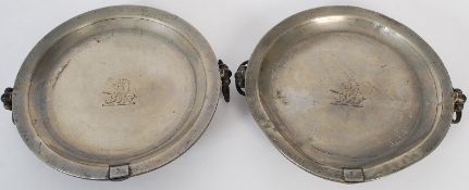 A silver plate Garrard & Co of London pressed taste de vin's of decorative form with one other.