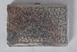 A William Neale Chester hallmarked rococo chase decorated card holder dating to 1896. The interior