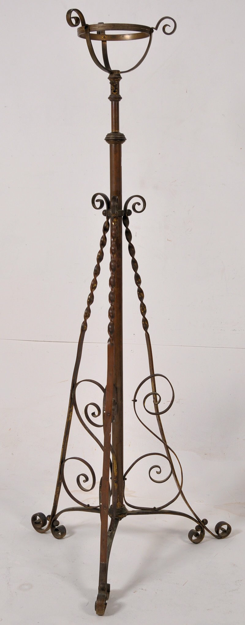 A 20th century adjustable cast metal brass oil lamp stand