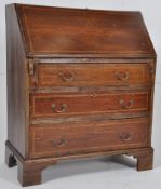 Edwardian mahogany inlaid bureau with fall front over chest of drawers beneath. 90cm x 76cm x 38cm.