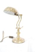 A 1960's / 1970's vintage bankers shell lamp with swivel column on terraced base