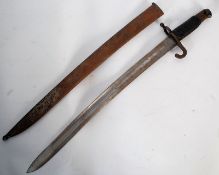 A 19th century French chassepot rifle bayonet and scabbard, the ricasse marked St Striblony?
