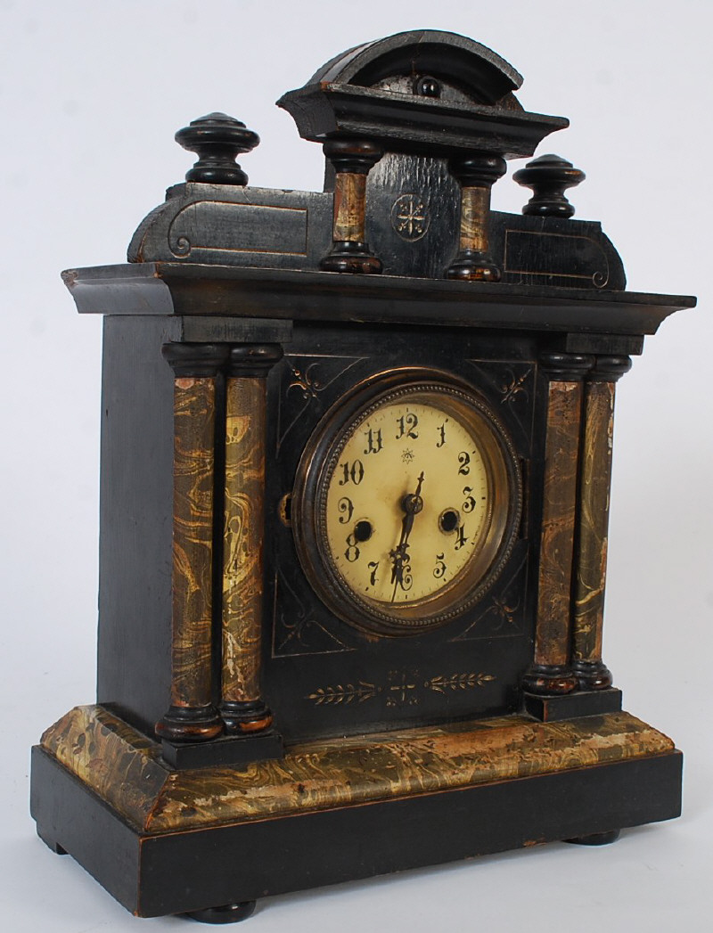 A Victorian faux slate and marble mantel clock being of painted wood construction with a brass