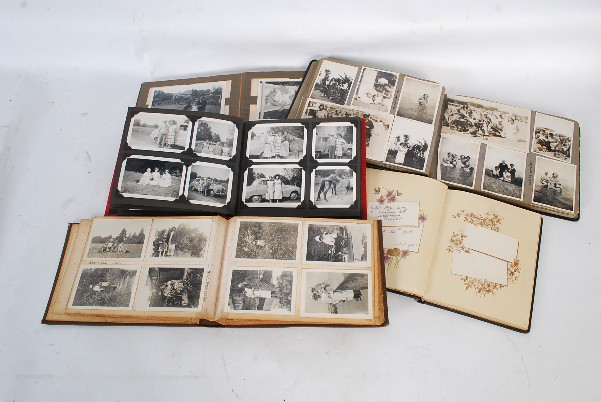 5 vintage 20th century photo albums, each filled with photos including views, portraits and other