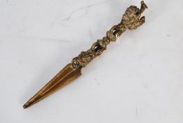 A 19th Century Tibetan brass threesided ritual dagger / phurba