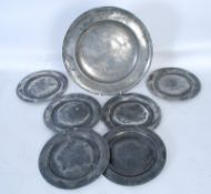 6 x 18th Century pewter side plates and a pewter platter with touch mark H.C and original owners