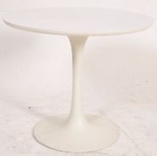 Arkana - A small white laminated `tulip` occasional table, cast mark to the loaded base, 44cm in