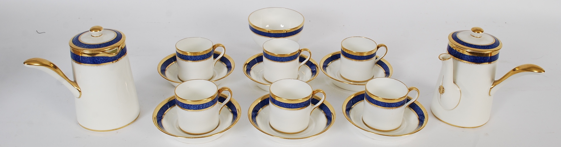 A Cauldron China tea / coffee set in deep royal blue rimmed colouring consisting of chocolate