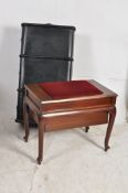 An early 20th century metal lined steamer trunk together with an Edwardian mahogany piano stool.