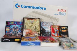 An Amiga 500 Commodore home computer in original box together with games and joystick. To include