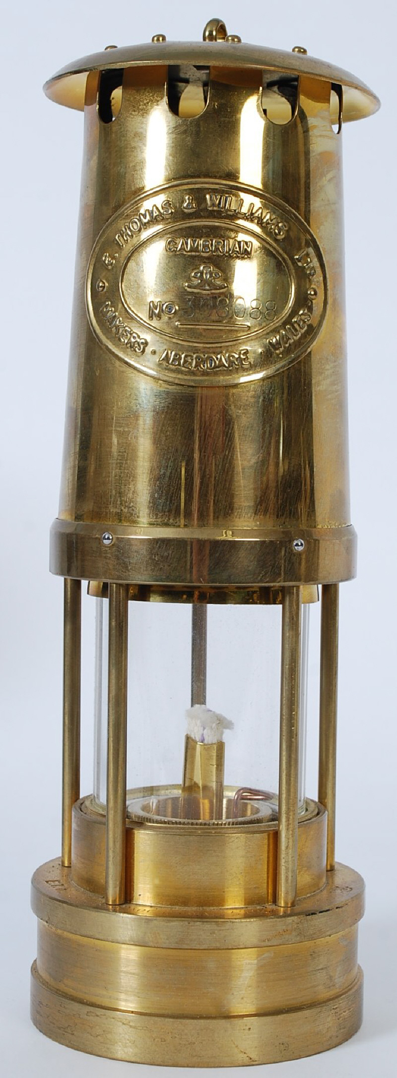 An E Thomas & Williams Ltd, Aberdare, Wales Cambrian brass miners lamp. 308088. 26cm tall.