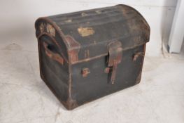 A Victorian leather bound dome top trunk originally retailed in Bristol, England completed by