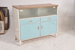 A retro 1950's two tone and formica top kitchen dresser cabinet. Stood on turned legs, blue cupboard